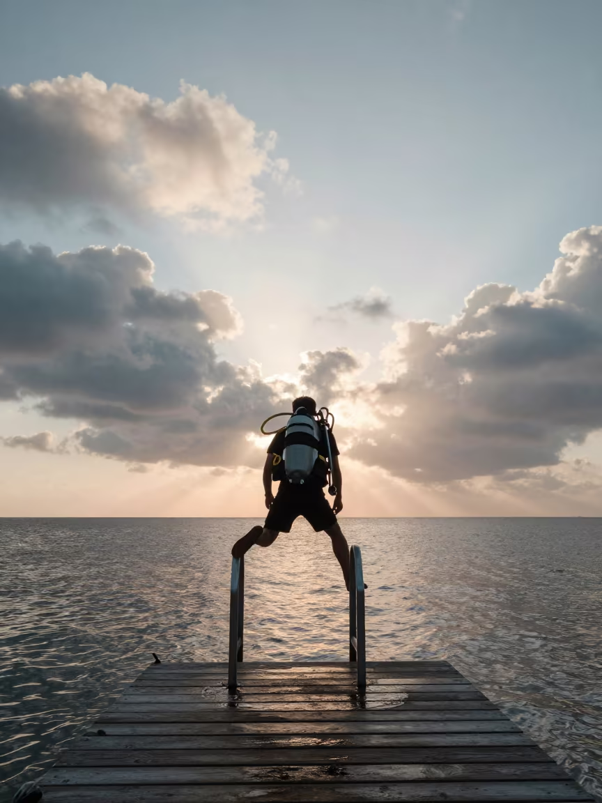 Diver Entering Calm Dawn Waters in in Chaman