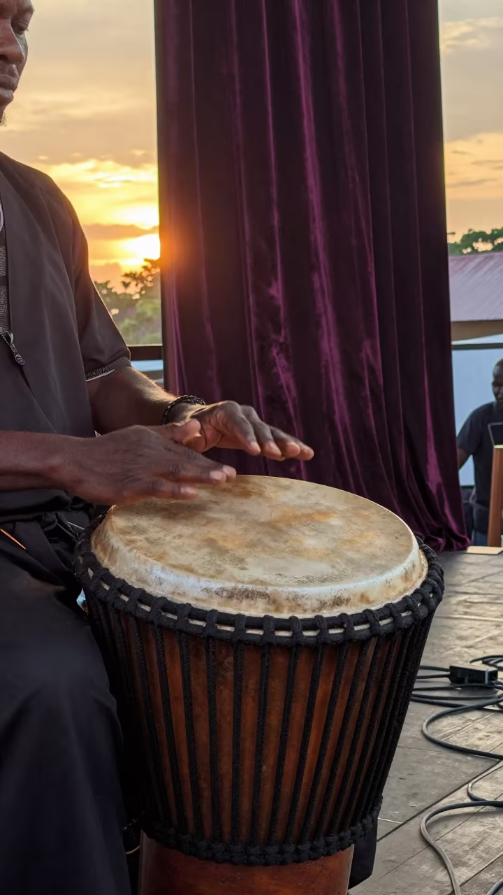 Djembe Drummer Golden Hour Stage Performance in on a theater stage in Bandar Lampung
