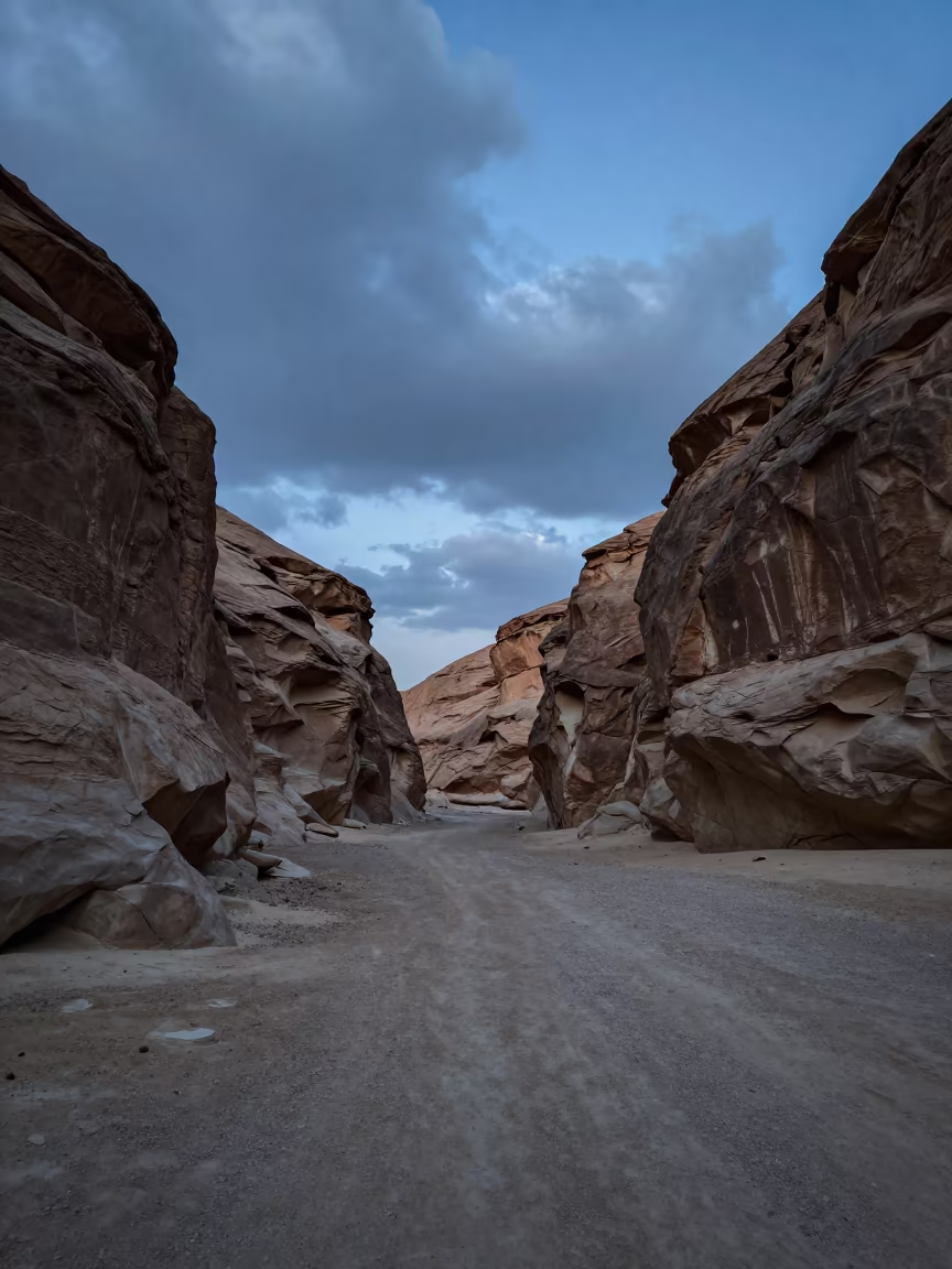 Doha Canyon Slot Blue Hour Valley in across a wide valley floor near Doha