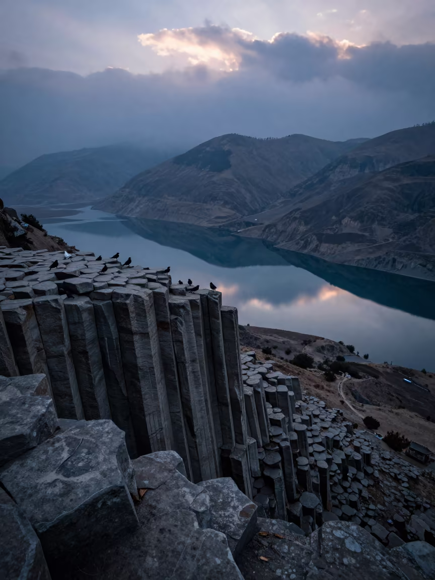 Dolerite Columns Above Misty Manali Foothills in from a ridge above layered foothills near Manali
