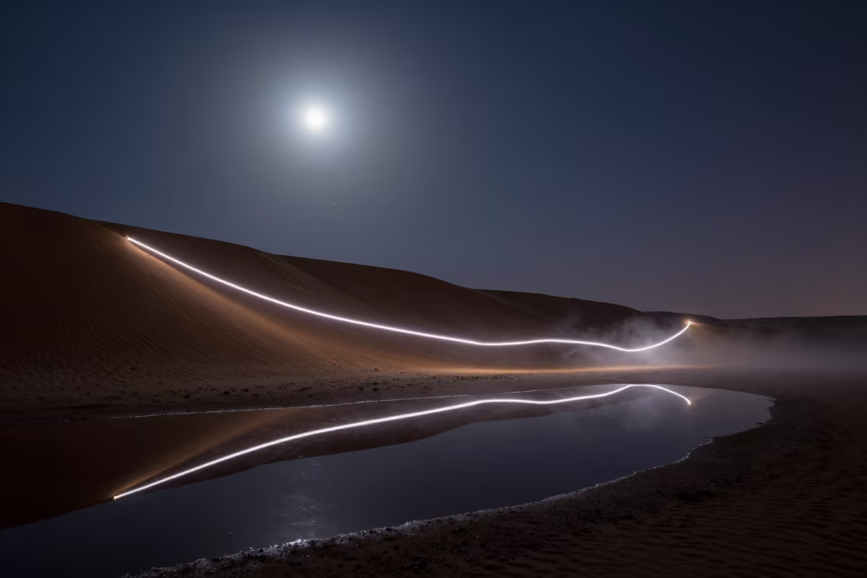 Drone Light Trail Over Granada Desert at Predawn in beneath a wind-cut desert escarpment near Centro, Granada