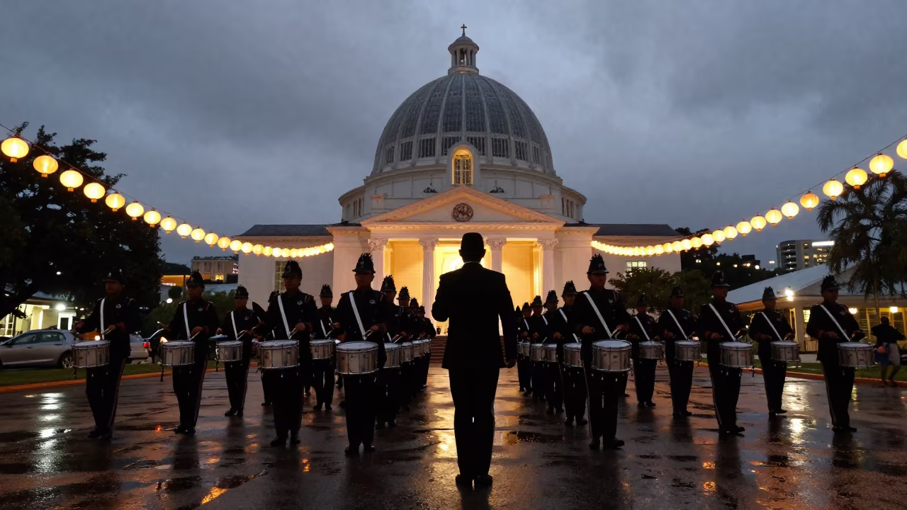 Drum Major Silhouette Belize Shrine Lanterns in in a shrine lined with lanterns in Belize City