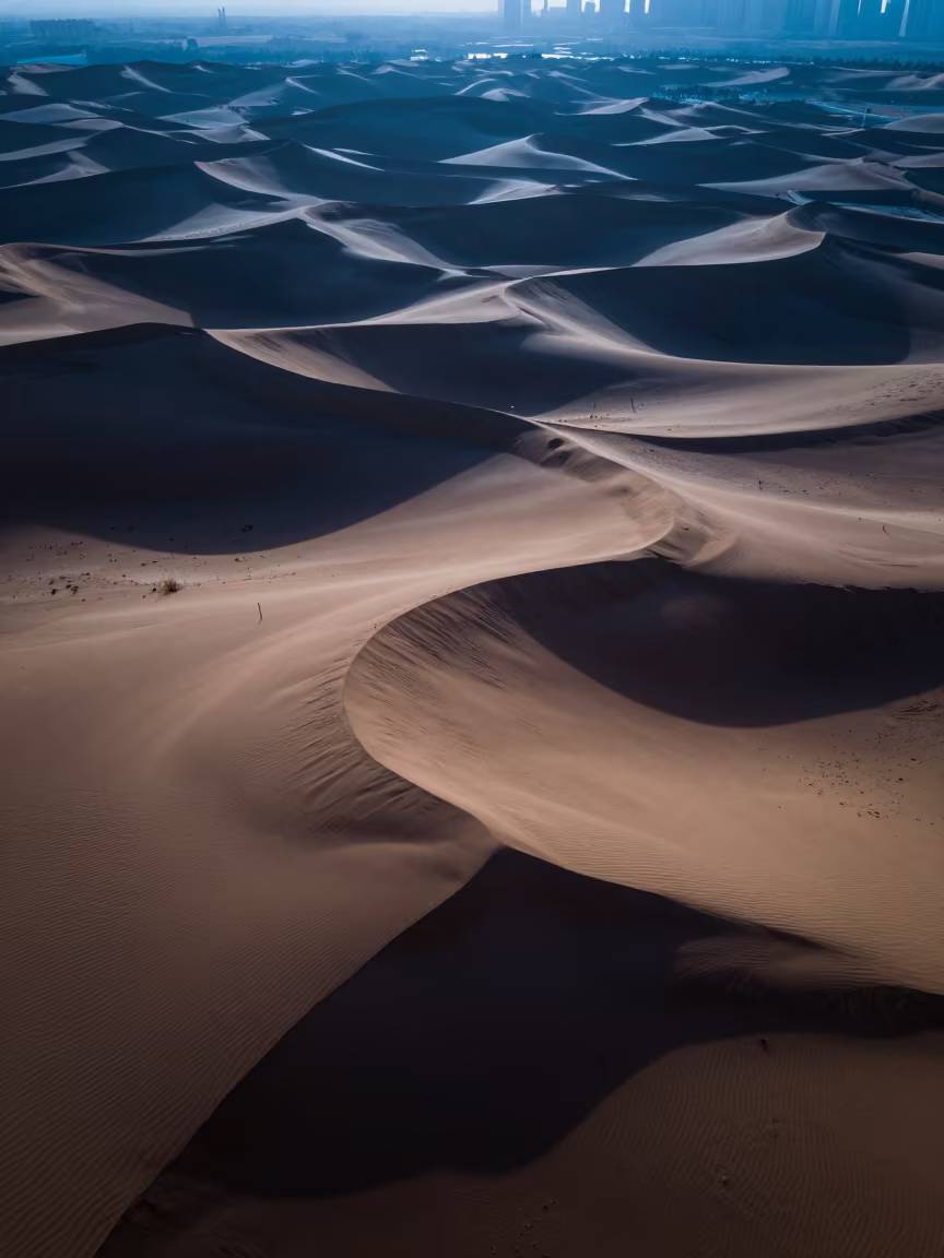 Dubai Sand Dunes Sharp Shadows Blue Hour in far above terraced hillsides near Downtown, Dubai