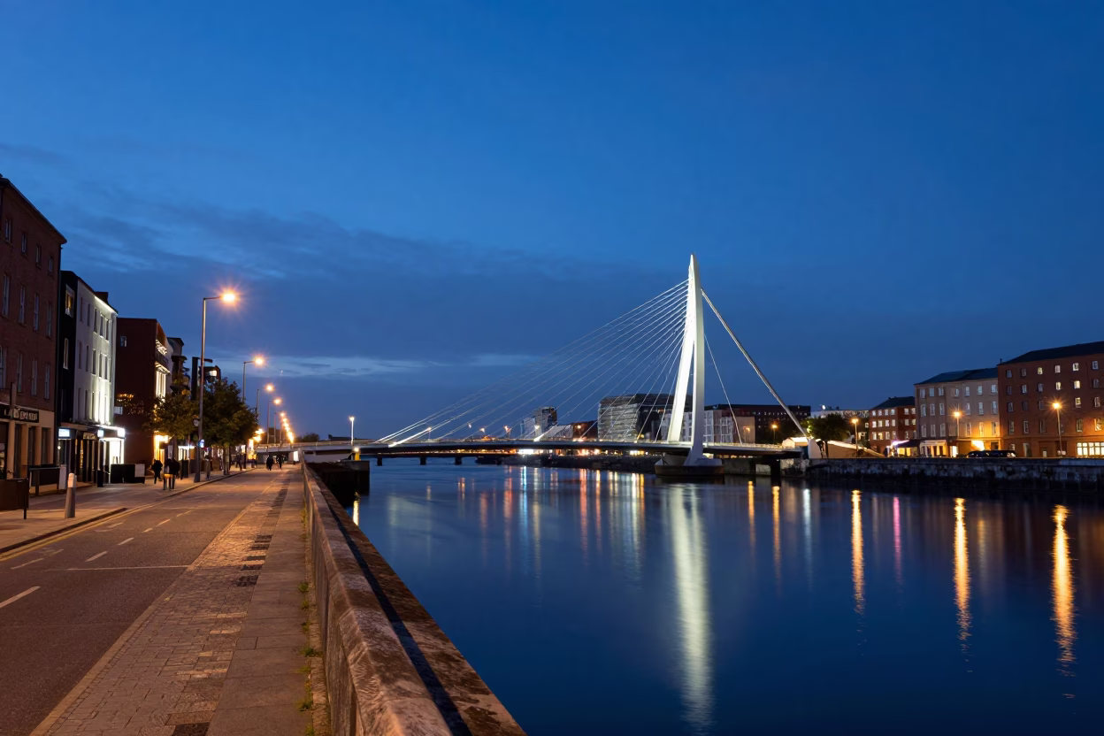 Dublin Blue Hour Street Scene with Illuminated Bridge and Harbor Reflections in in Dublin, Ireland