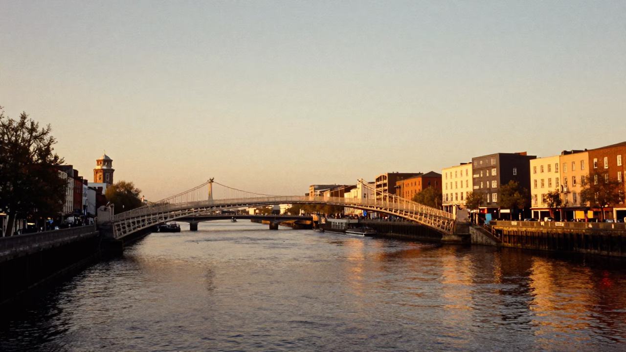 Dublin Evening Landscape with Iron Bridge and River Liffey in Honeyed Light in in Dublin, Ireland