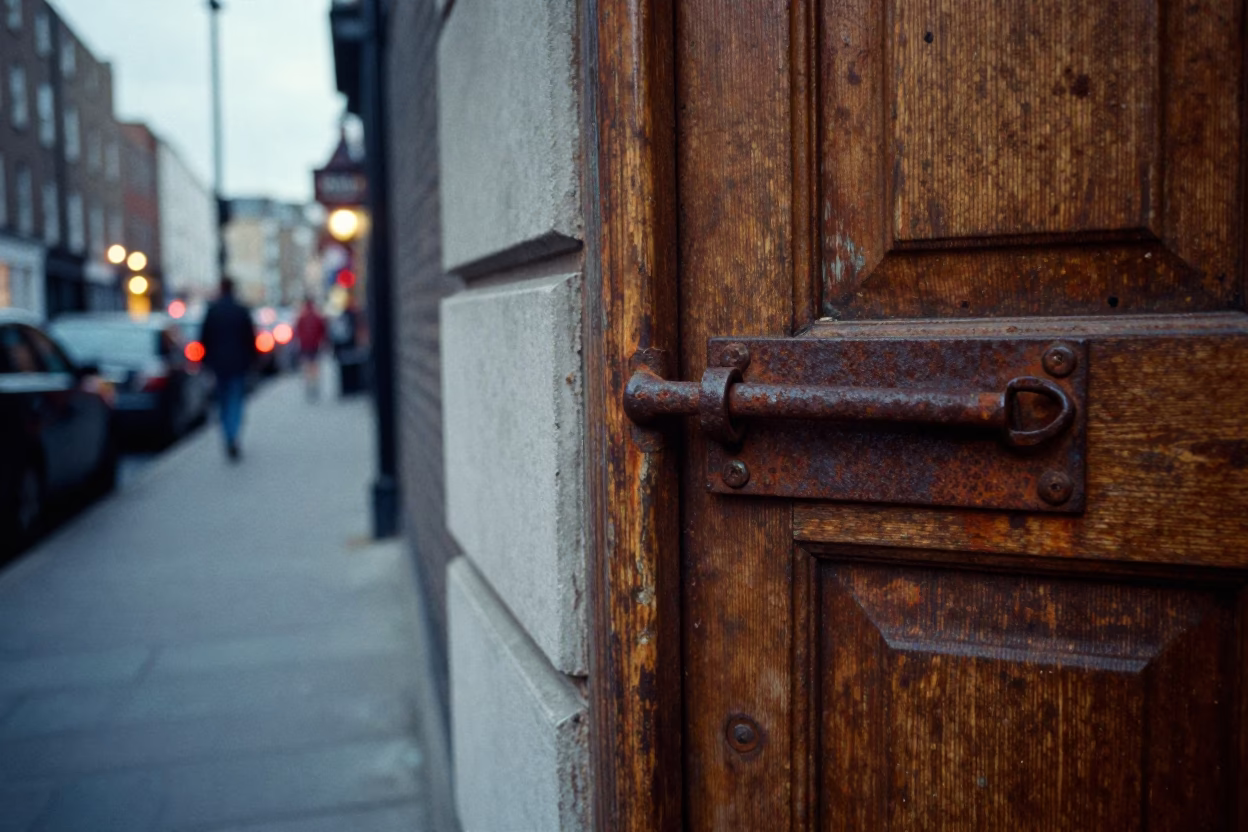 Dublin Evening Street Scene with Rusty Iron Latch and City Lights in in Dublin, Ireland