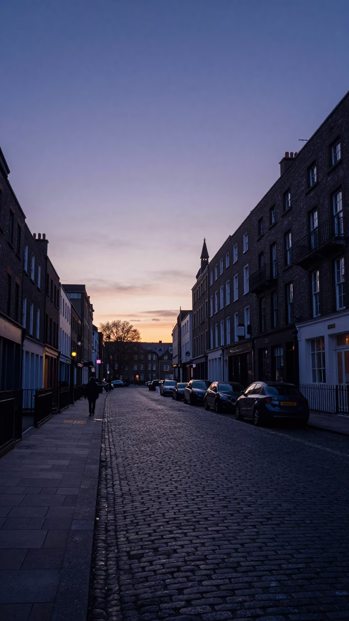 Dublin Ireland Early Morning Street Scene Before Sunrise with Cobblestones and Streetlights in in Dublin, Ireland