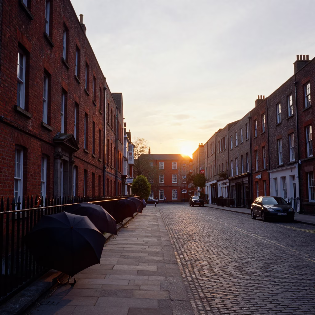 Dublin Ireland evening street scene with umbrellas and traditional architecture at sunset in in Dublin, Ireland