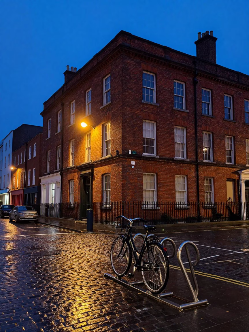 Dublin Ireland indigo twilight street scene with red brick architecture and campus bicycle rack in in Dublin, Ireland
