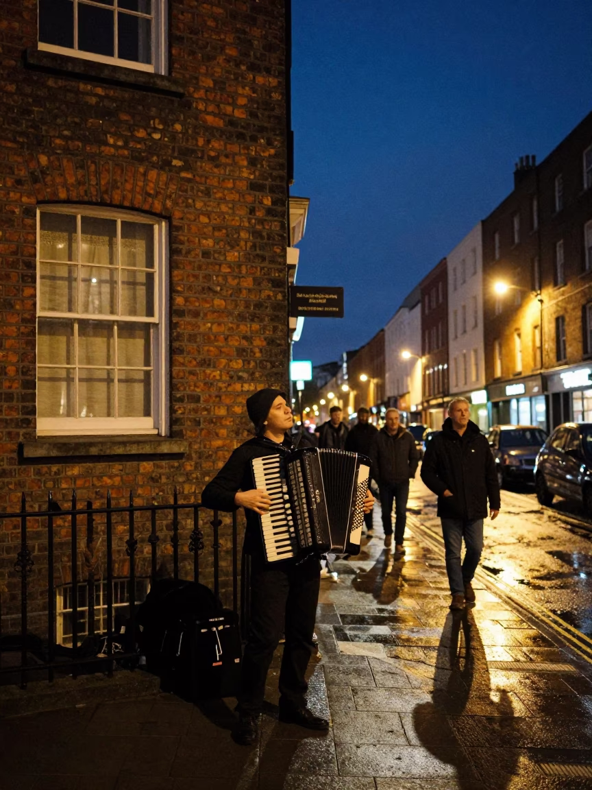 Dublin Ireland Night Street Scene with Accordion Player and City Lights in in Dublin, Ireland