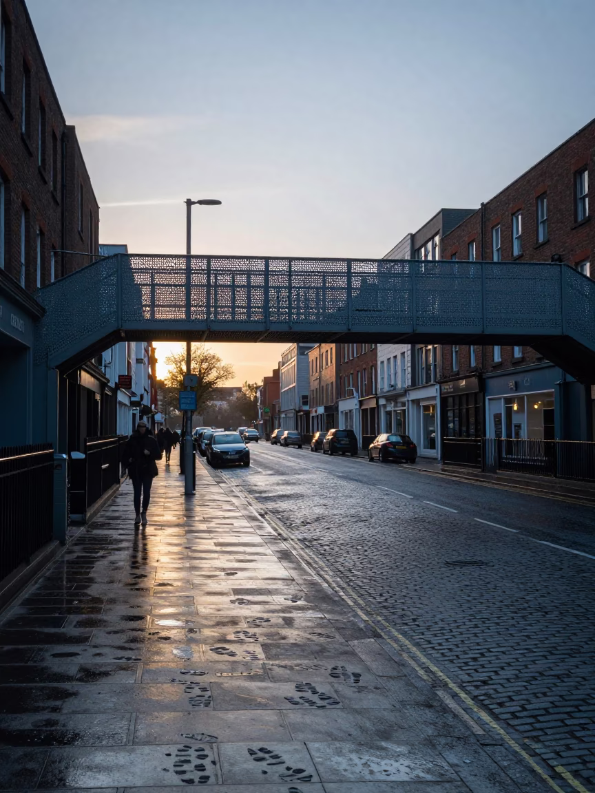 Dublin Ireland Pre-Dawn Street Scene Pedestrian Overpass Wet Footsteps Perforated Metal in in Dublin, Ireland