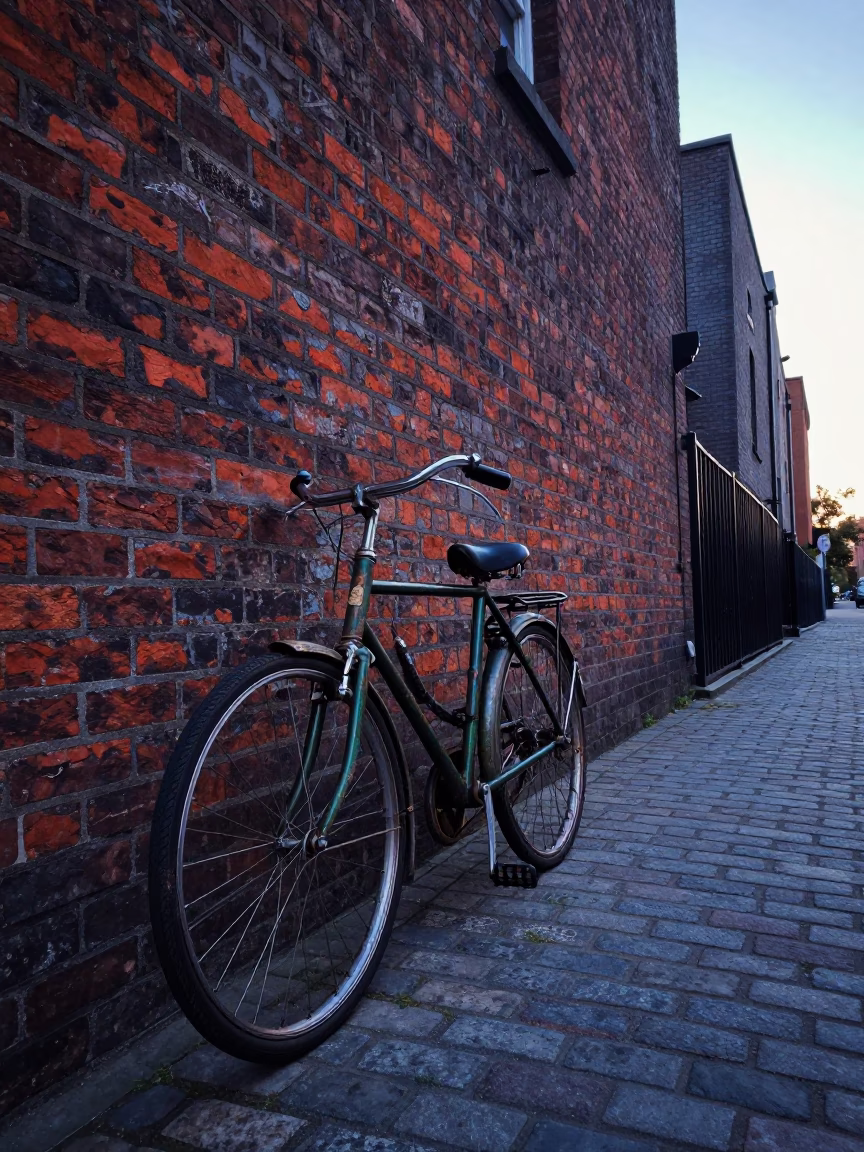 Dublin Ireland pre-dawn street scene vintage bicycle against brick wall in in Dublin, Ireland