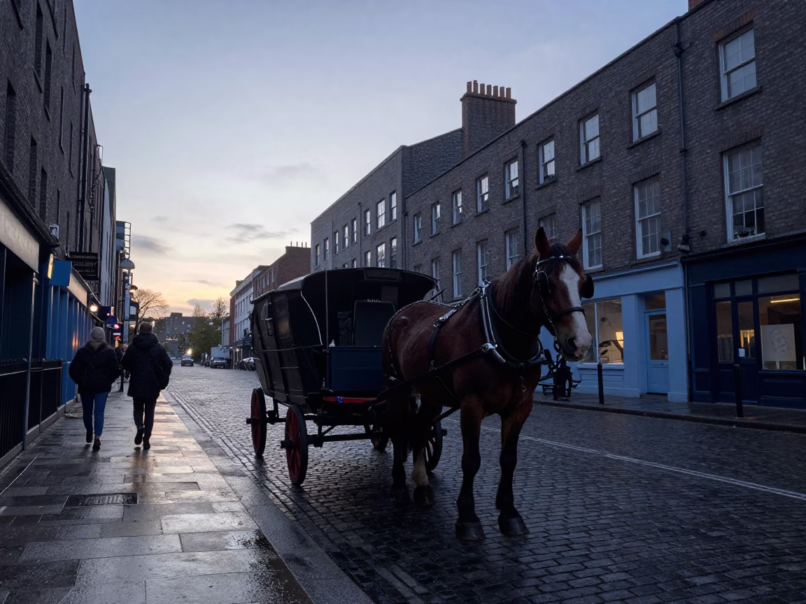 Dublin Ireland Pre Dawn Street Scene with Horse Drawn Cart on Cobblestone in in Dublin, Ireland