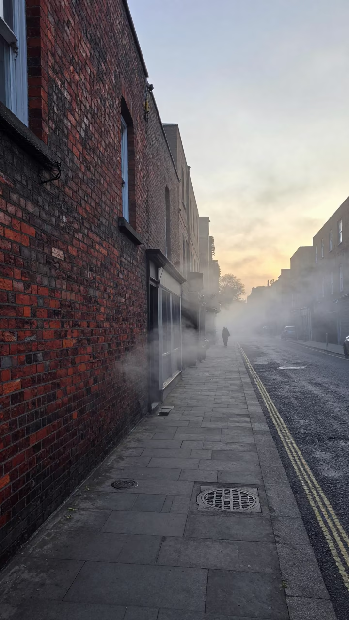 Dublin Ireland Pre-Dawn Street Scene With Steam Haze And Brick Architecture in in Dublin, Ireland