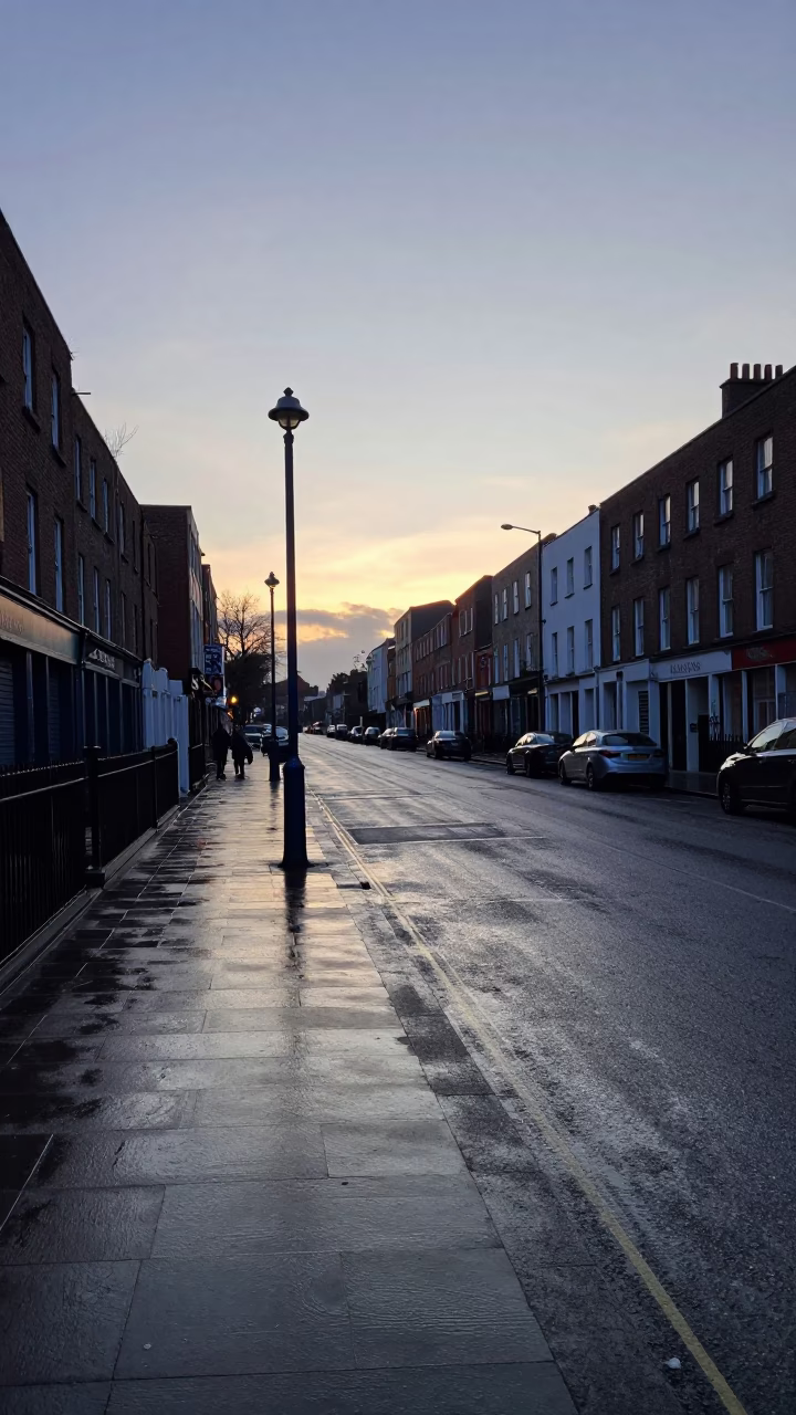 Dublin Ireland Pre-Dawn Street Scene with Substation Access Road and Rainwater Reflections in in Dublin, Ireland