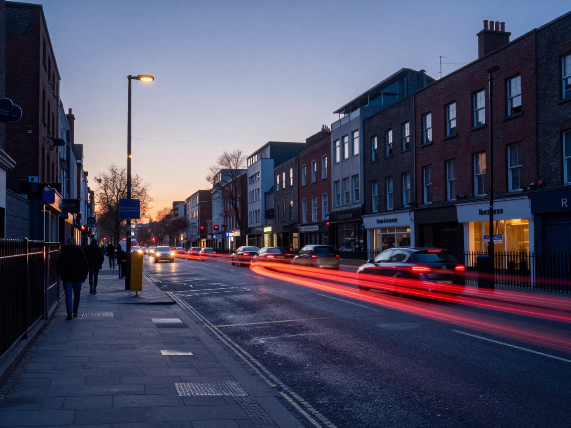 Dublin Ireland street corner before sunrise with taillight streaks and historic architecture in in Dublin, Ireland