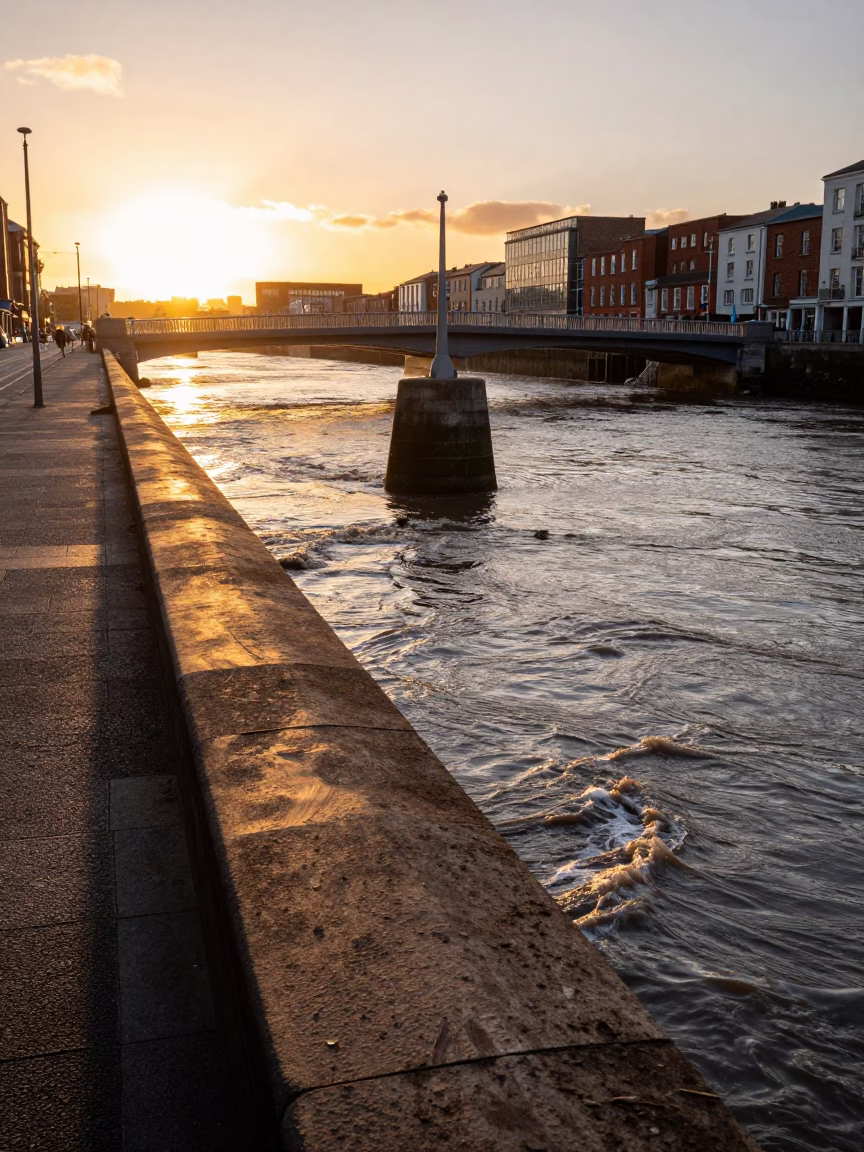 Dublin Sunset Street Scene with Bridge Pier and Local Life in in Dublin, Ireland