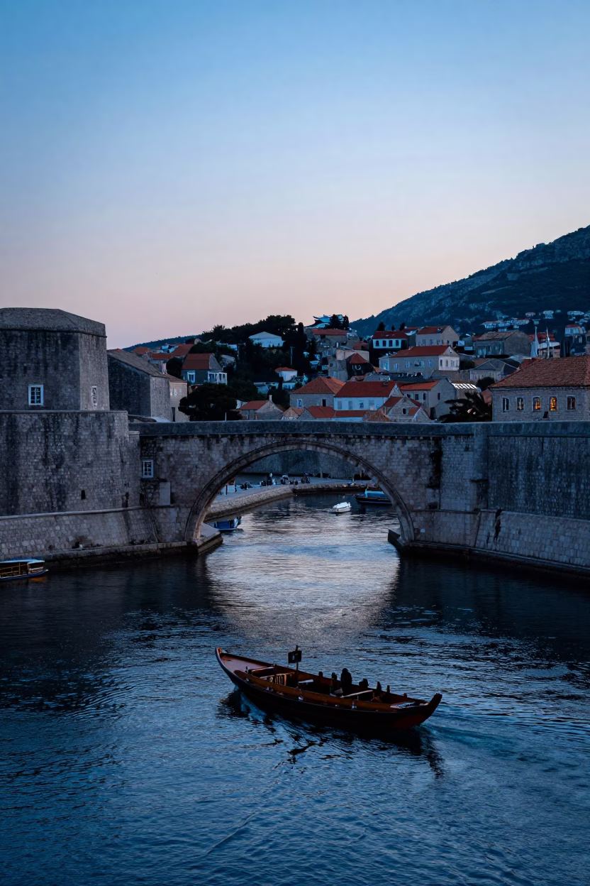 Dubrovnik Croatia Pre-Dawn Harbor Scene with Gothic Bridge and Breakwater Beacon in in Dubrovnik, Croatia