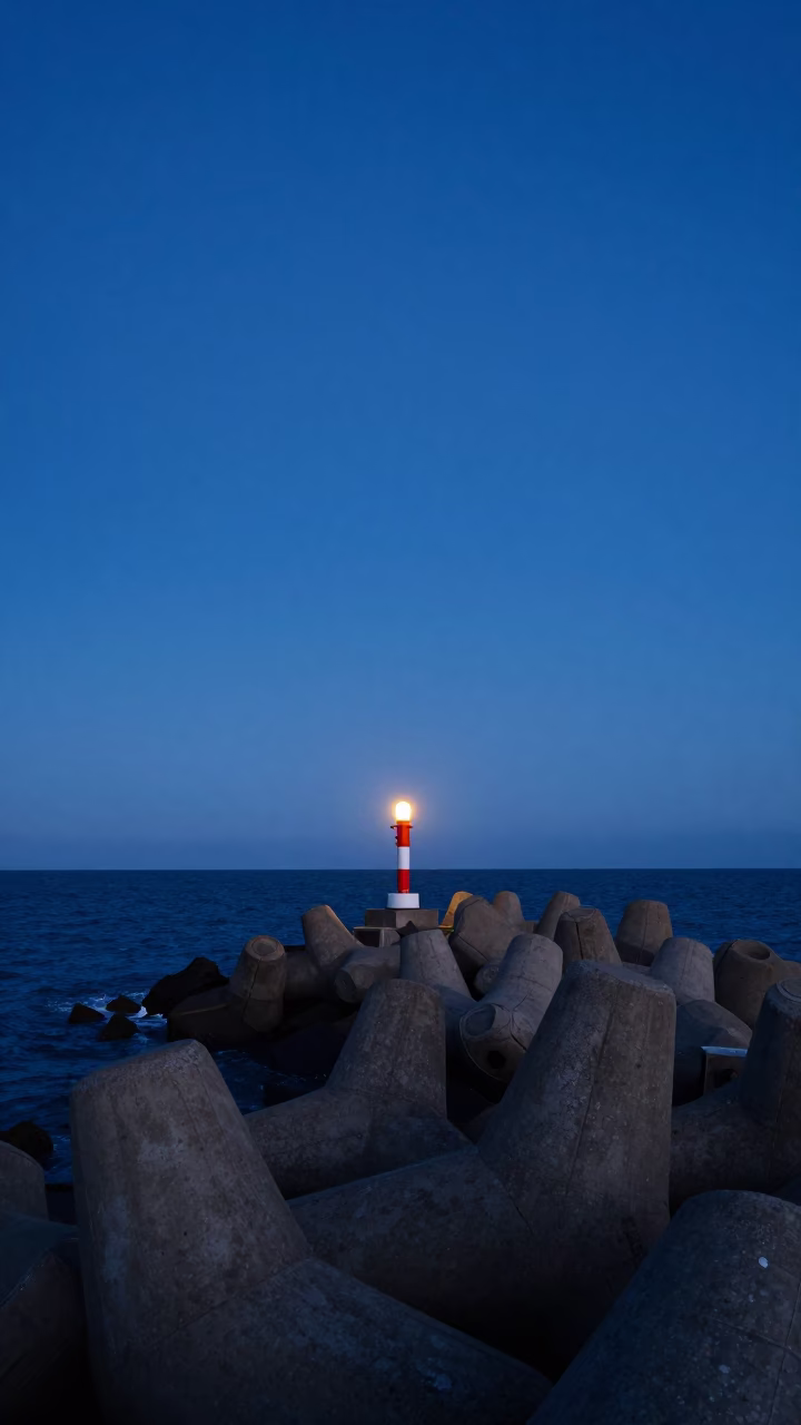 Durban South Africa Coastal Breakwater Warning Beacons at Blue Hour After Sunset in in Durban, South Africa