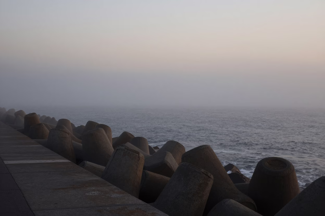 Durban South Africa Early Evening Sea Fog Crawling Over Breakwater at Dawn in in Durban, South Africa