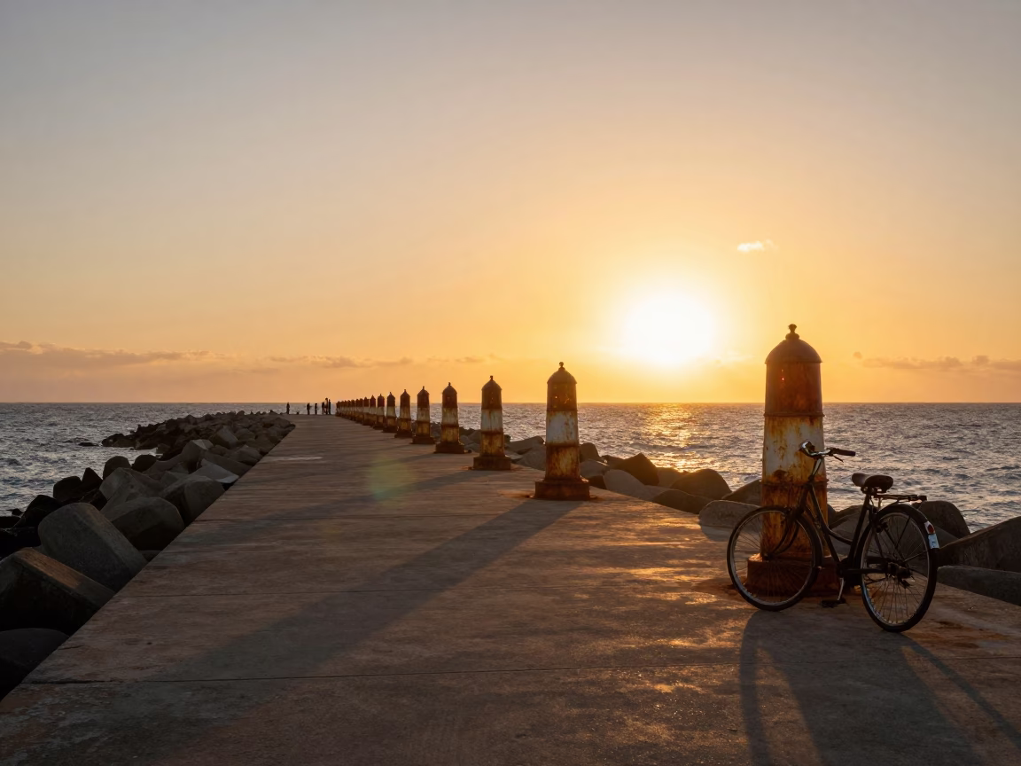 Durban South Africa Sunset Coastal Breakwater Warning Beacons and Vintage Bicycle in in Durban, South Africa