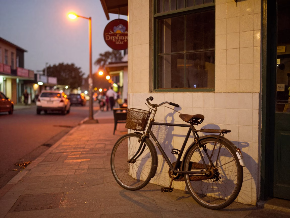 Durban Street Scene at Dusk with Bicycle and Rusty Lamp Post in in Durban, South Africa