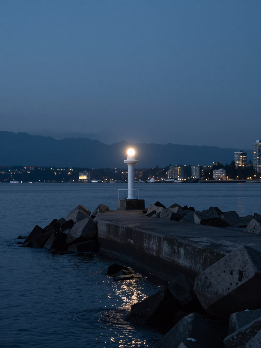 Dusk at Vancouver Breakwater with Warning Beacons and Coastal Haze in in Vancouver, British Columbia, Canada