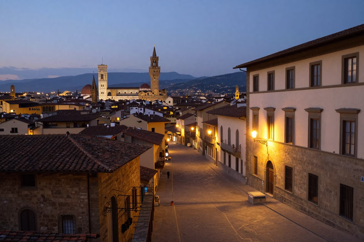 Dusk street scene in Florence Italy with historic architecture and evening city lights glowing in in Florence, Italy