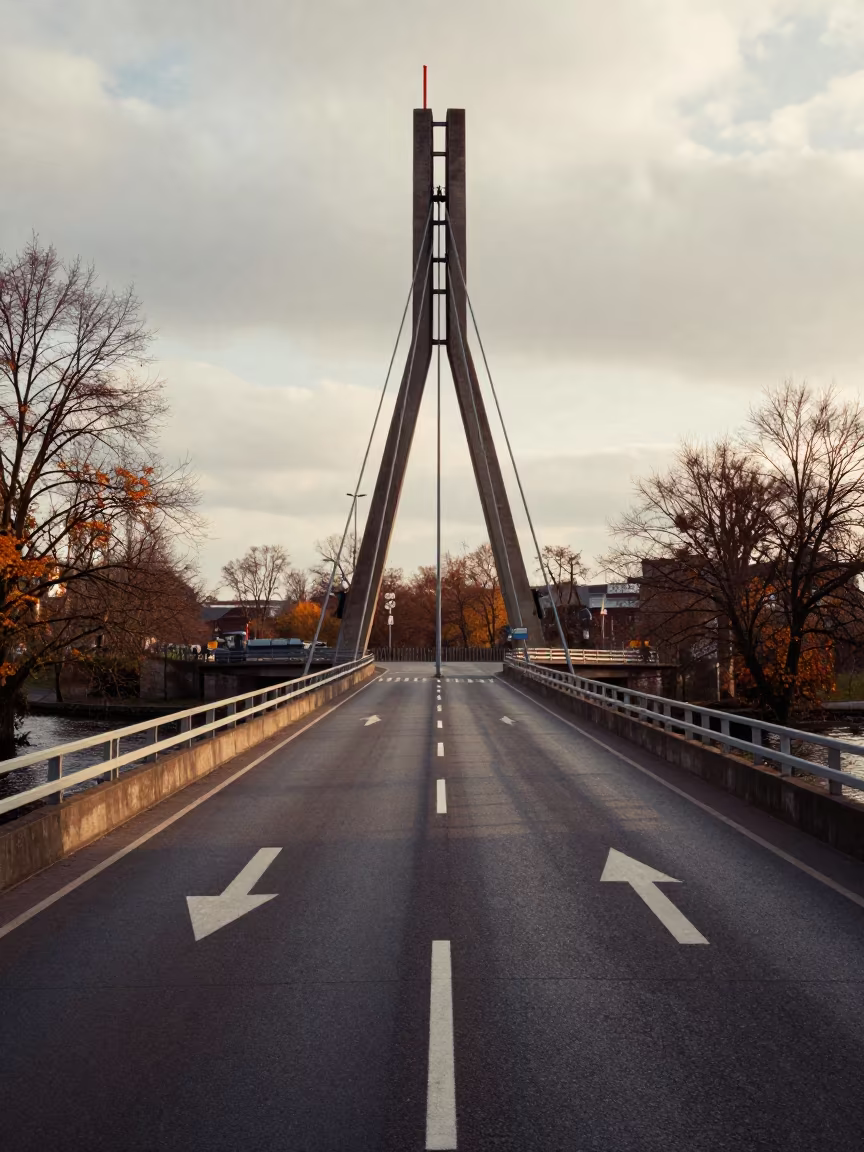 Dusseldorf Overpass Interchange with White Arrows in beside a storm surge barrier in Dusseldorf
