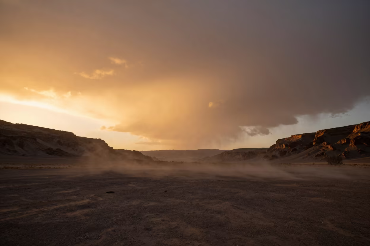 Dust Storm Sunset Over Nevada Thunderheads in over a horizon of stacked thunderheads in Nevada