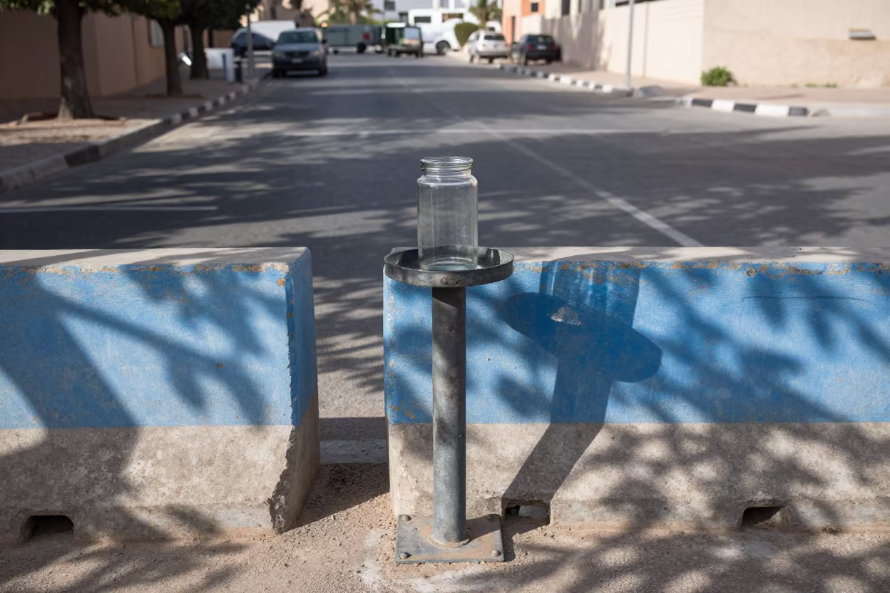 Dusty Fuel Sample Jar at Moroccan Checkpoint in at a checkpoint lane in Morocco