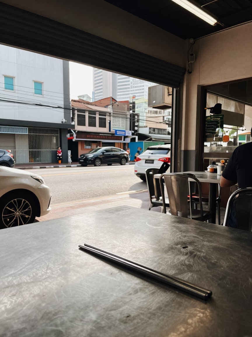 Early Afternoon Street Scene in Kuala Lumpur Malaysia with Cutlery and Urban Life in in Kuala Lumpur, Malaysia