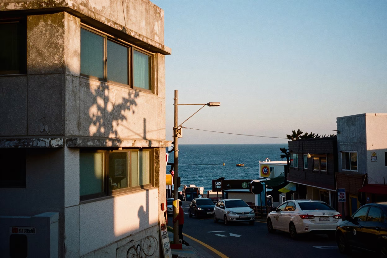 Early Evening Busan Street Scene with Condor Shadow and Vintage Decanter Detail in in Busan, South Korea