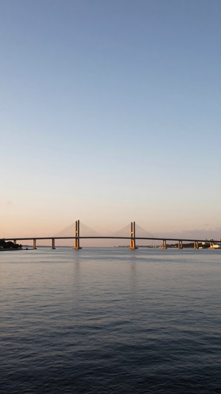 Early Evening Horizon View of Salvador Brazil Harbor and Bridge Piers from Waterfront Promenade in in Salvador, Brazil