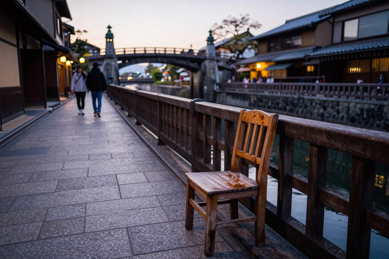 Early Evening Kyoto Street Scene with Sluice Gate and Tea Stained Chair in in Kyoto, Japan