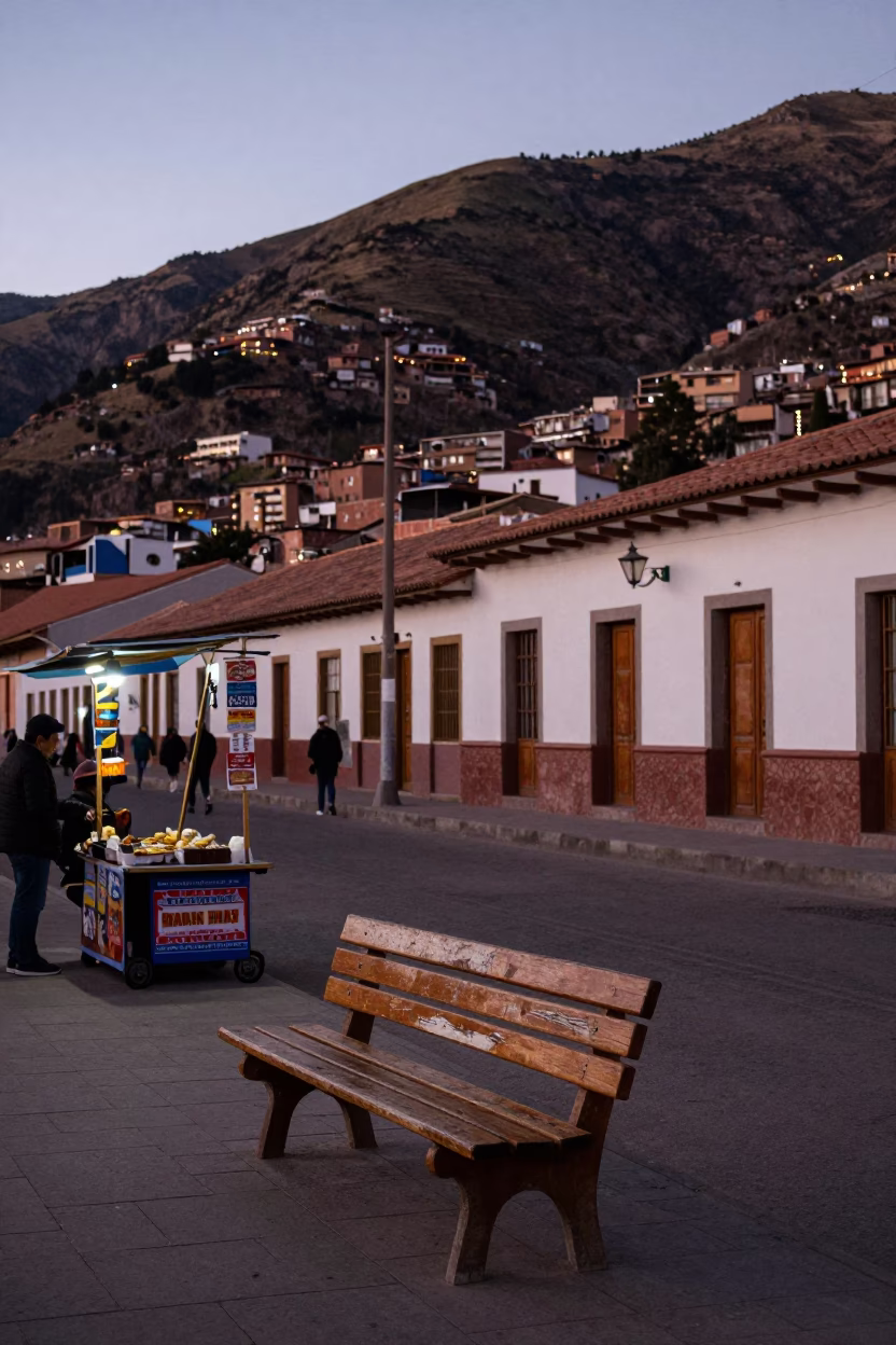 Early Evening La Paz Bolivia Street Scene with Wooden Bench and Glass Tumbler in in La Paz, Bolivia