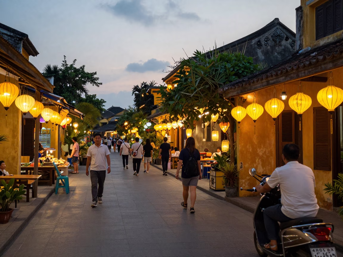 Early Evening Street Scene in Hoi An Vietnam with Lanterns and River in in Hoi An, Vietnam