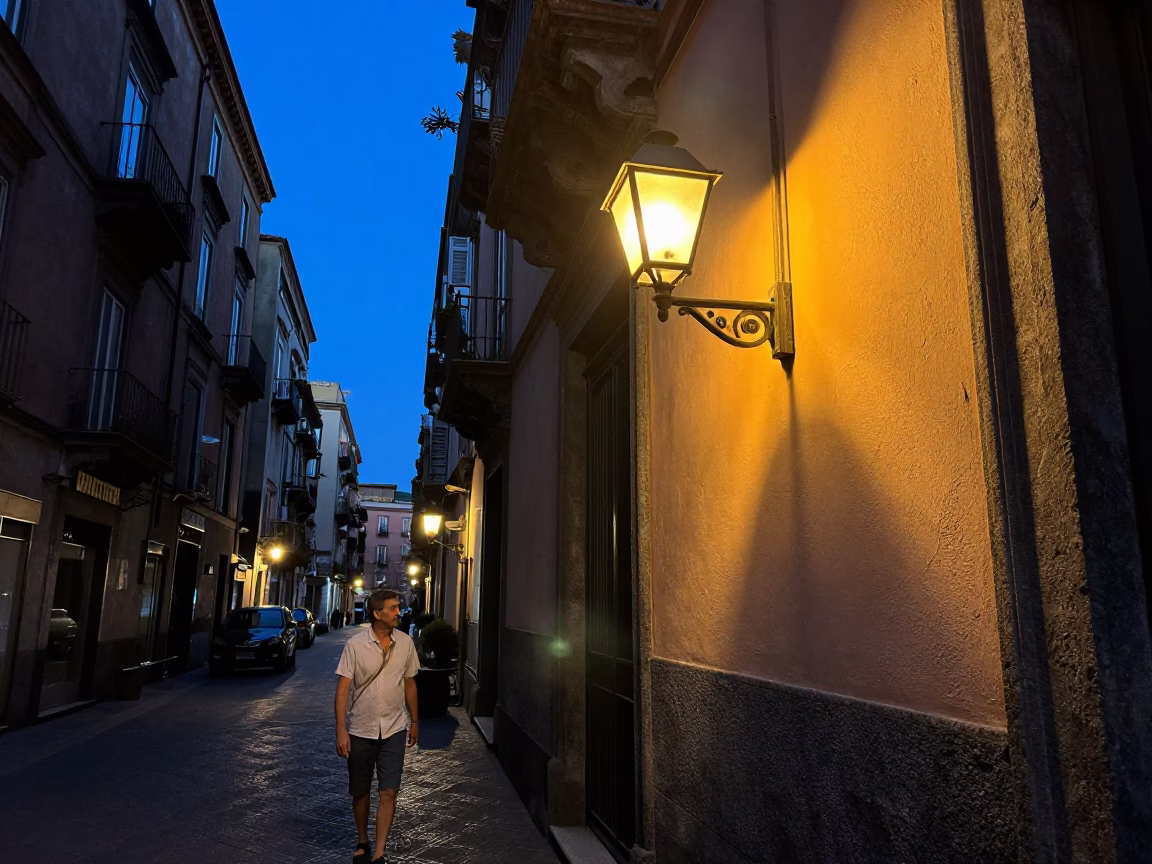 Early Evening Street Scene in Naples Italy with Vintage Wall Sconce and Local Architecture in in Naples, Italy
