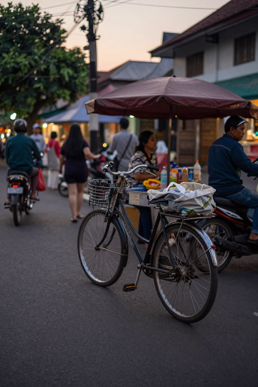 Early evening street scene in Yogyakarta Indonesia with local vendor and traditional architecture in in Yogyakarta, Indonesia