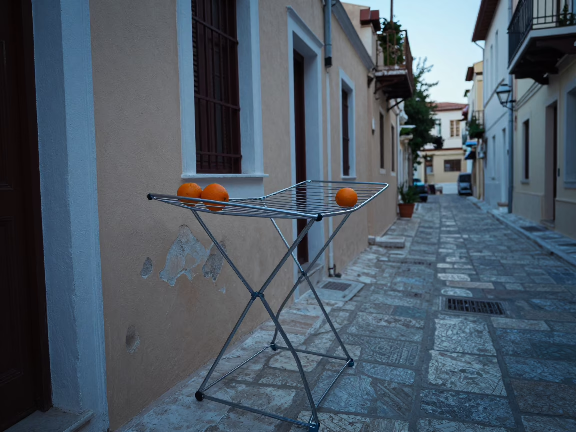 Early Morning Athens Street Scene with Drying Rack and Oranges in Greece in in Athens, Greece