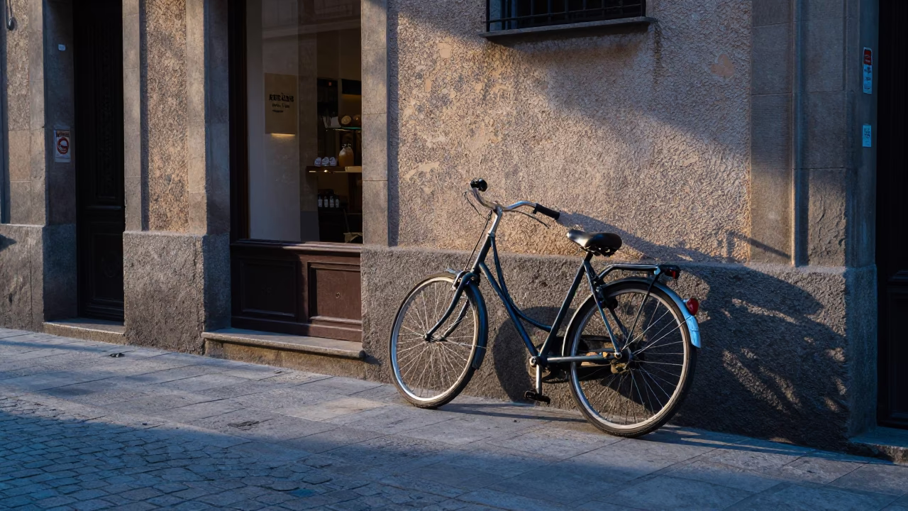 Early Morning Barcelona Street Scene with Bicycle Propped Against Bakery Facade in in Barcelona, Spain