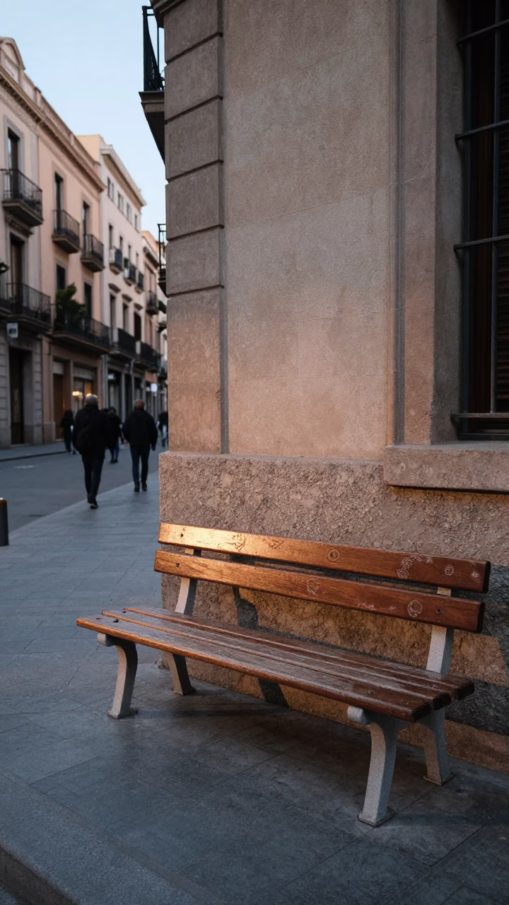 Early Morning Barcelona Street Scene with Wooden Bench and Terracotta Pot in in Barcelona, Spain