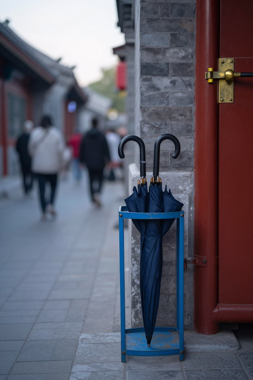 Early Morning Beijing Street Scene with Umbrella Stand and Latch Detail in in Beijing, China