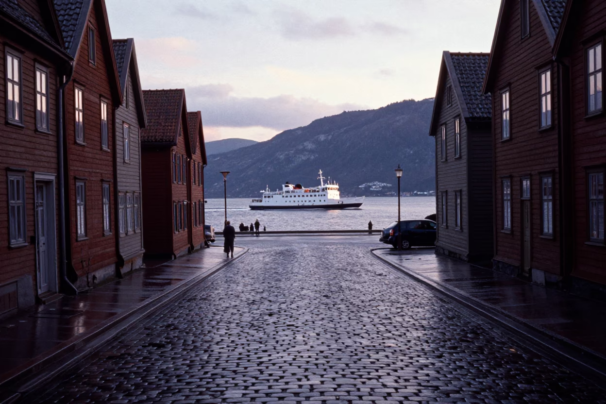 Early Morning Bergen Norway Ferry and Cobblestone Street Before Sunrise in in Bergen, Norway