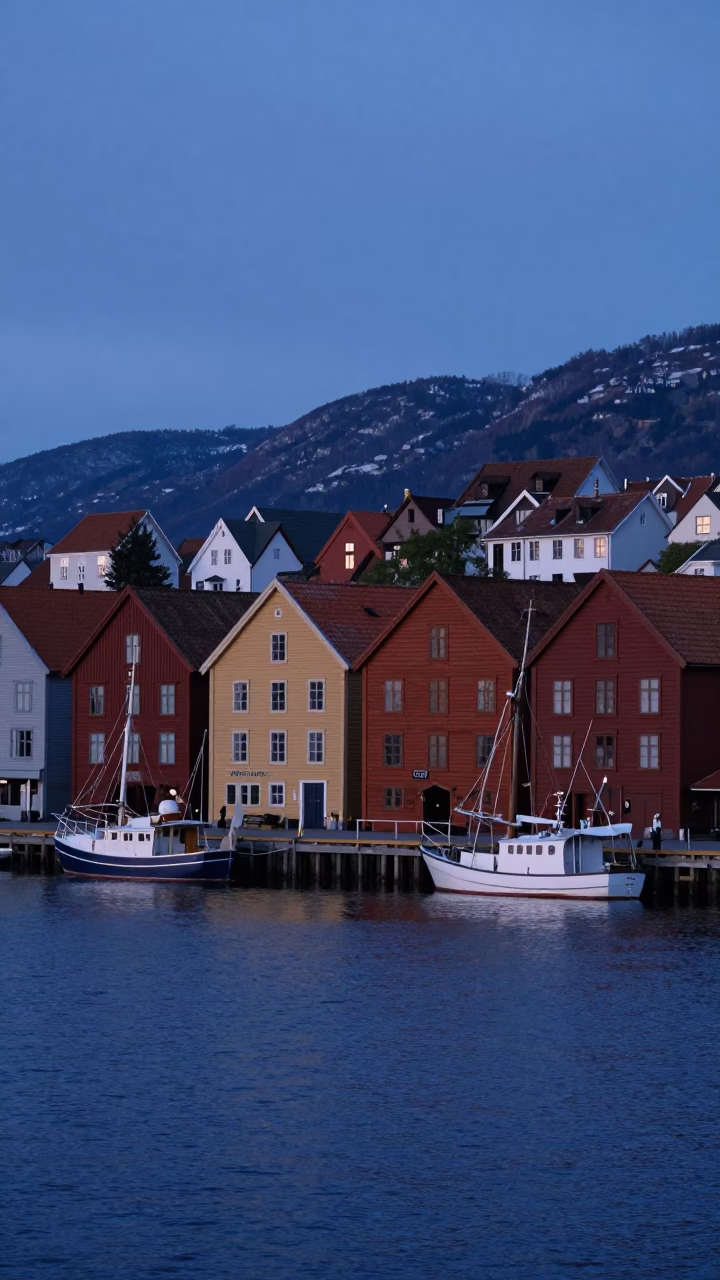 Early Morning Bergen Norway Harbor Scene with Fishing Boats and Cobblestone Wharf in in Bergen, Norway