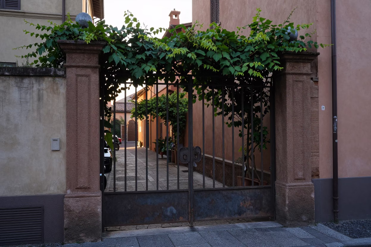 Early Morning Bologna Italy Street Scene with Vintage Garden Gate and Vine in in Bologna, Italy
