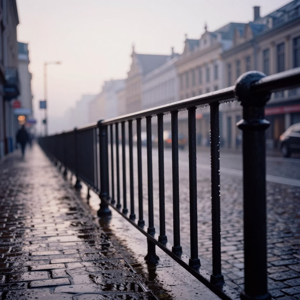 Early Morning Brussels Street Scene with Condensation on Rail and Urban Details in in Brussels, Belgium