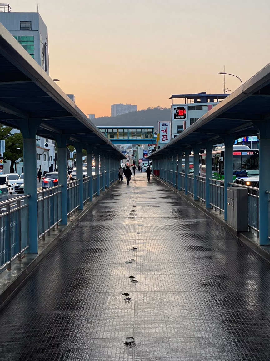 Early Morning Busan Street Scene with Pedestrian Overpass and Wet Footsteps in in Busan, South Korea