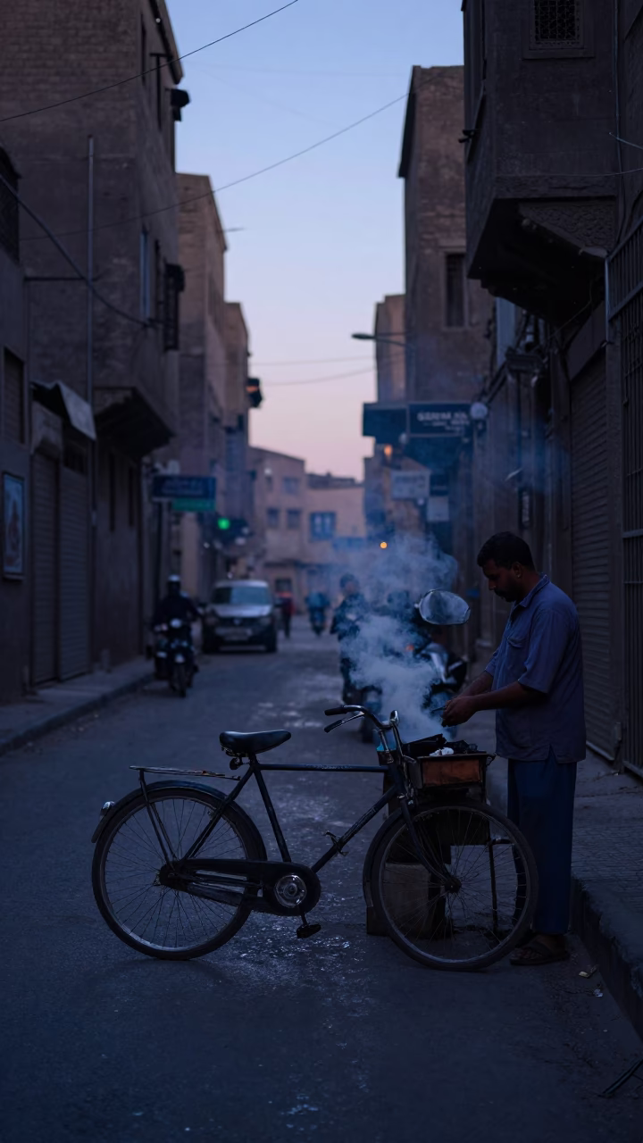 Early Morning Cairo Street Scene with Vintage Bicycle and Coffee Vendor Before Dawn in in Cairo, Egypt