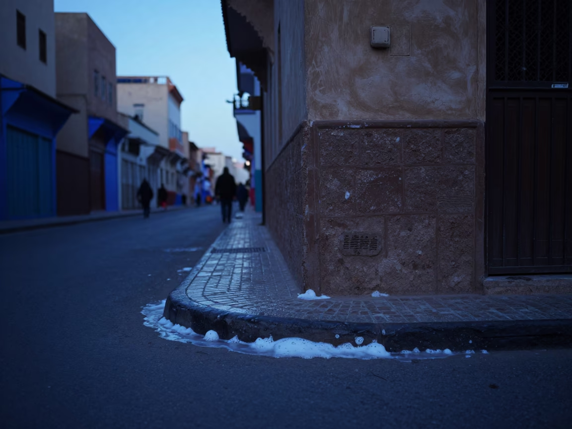 Early Morning Casablanca Street Scene with Soap Residue and Quiet Urban Details Before Dawn in in Casablanca, Morocco